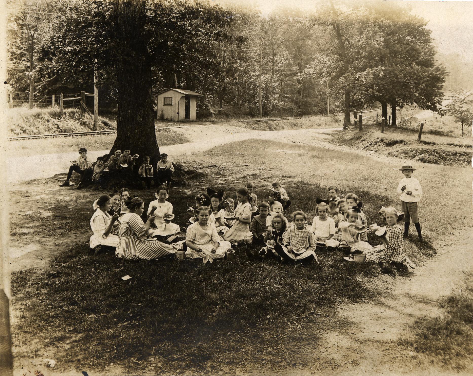 Stump Hall Trolley station beyond Stump Hall School children